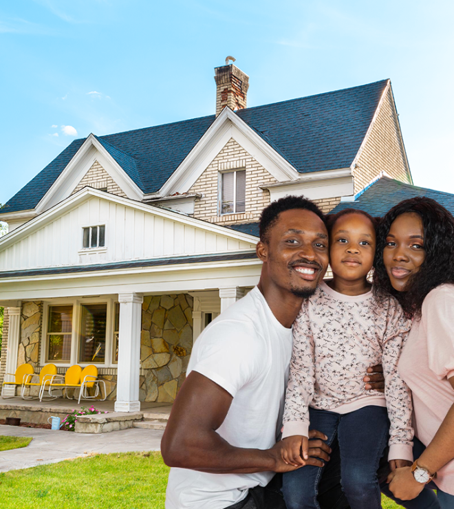 Family standing in front of their house - Houseowners Insurance